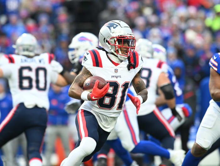 Dec 31, 2023; Orchard Park, New York, USA; New England Patriots wide receiver DeMario Douglas (81) runs a sweep against the Buffalo Bills in the first quarter at Highmark Stadium.
